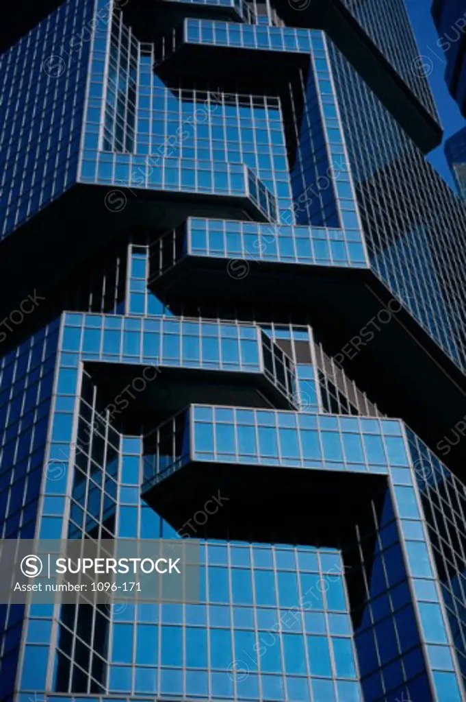 Low angle view of an office building, Lippo Centre, Hong Kong, China