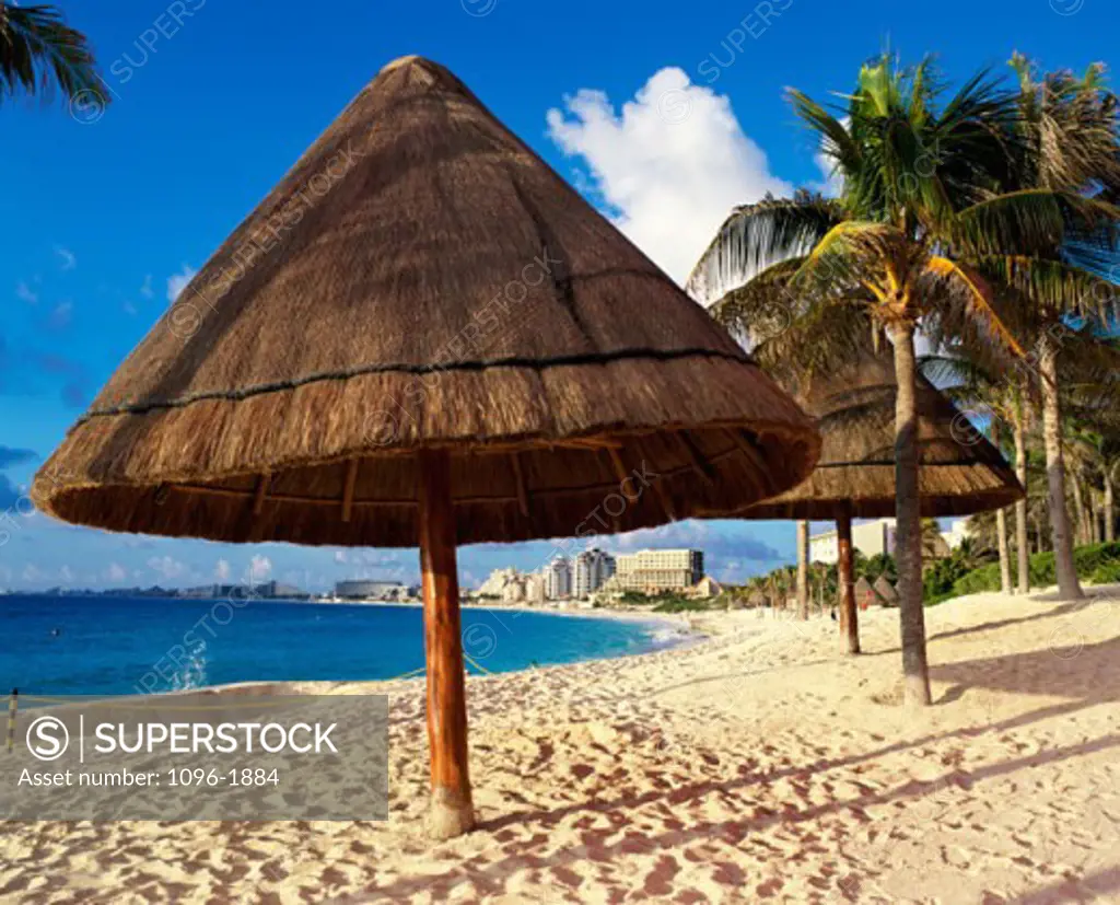 Sunshade umbrellas on a beach, Cancun, Mexico