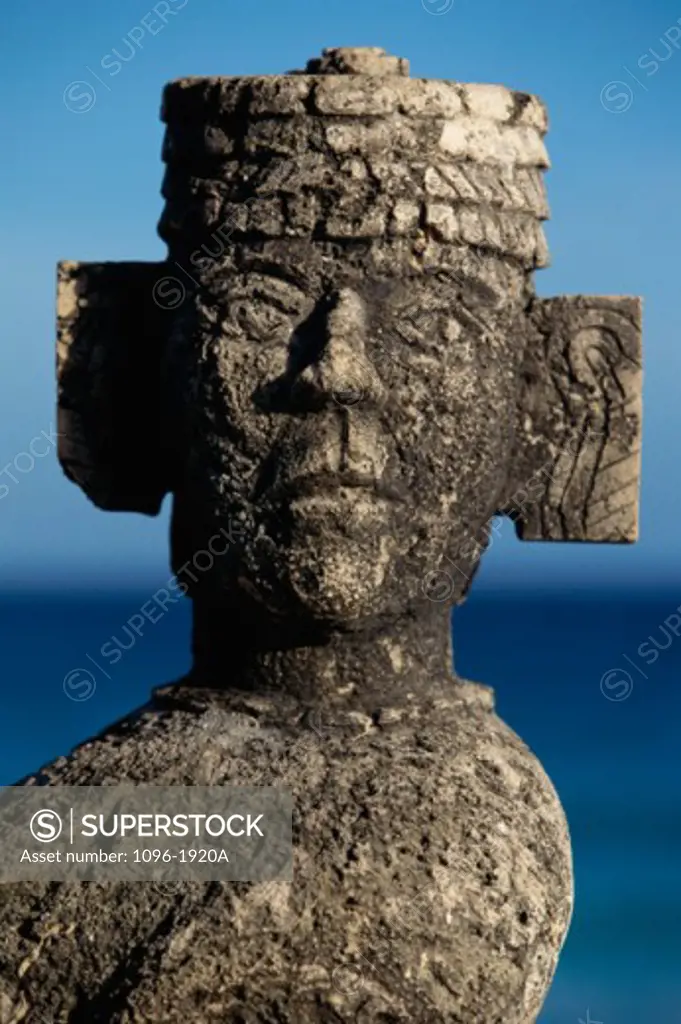 Close-up of Chac Mool statue on the beach, Cancun, Mexico