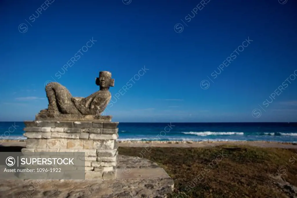 Chac Mool statue on the beach, Cancun, Mexico