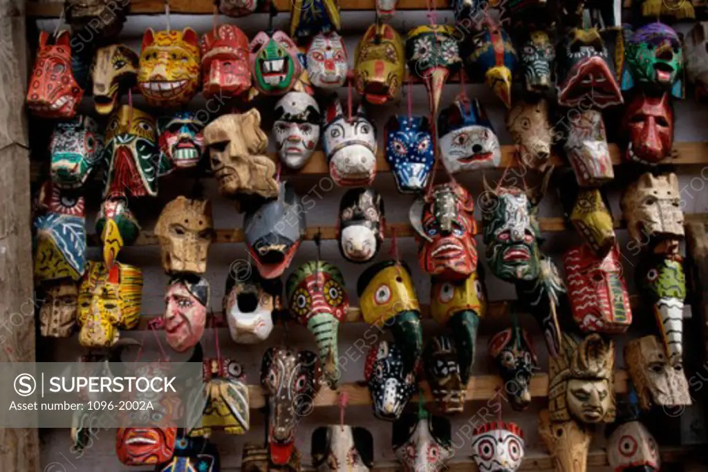 Masks in a market stall, Guatemala