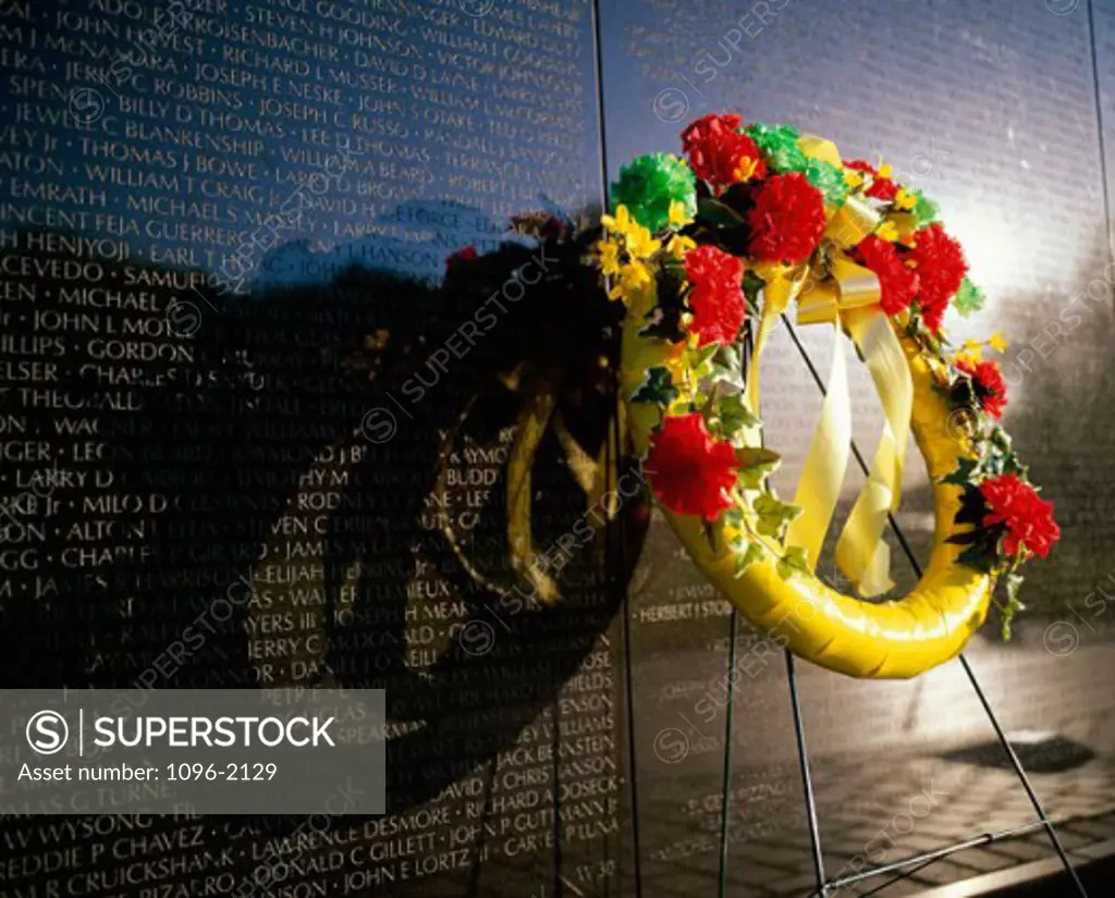 Wreath on the Vietnam Veterans Memorial Wall, Vietnam Veterans Memorial, Washington, D.C., USA