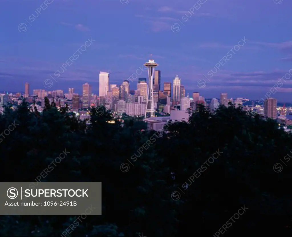 Skyline and Space Needle illuminated at dusk, Seattle, Washington, USA