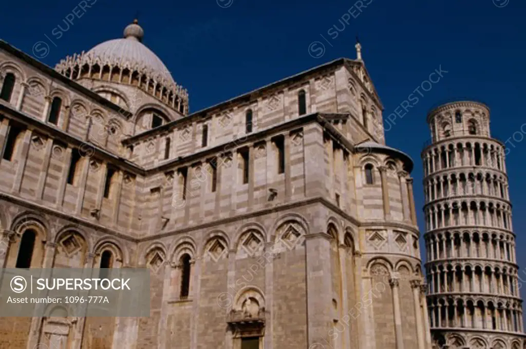 Low angle view of a cathedral near a tower, Duomo, Leaning Tower, Pisa, Italy