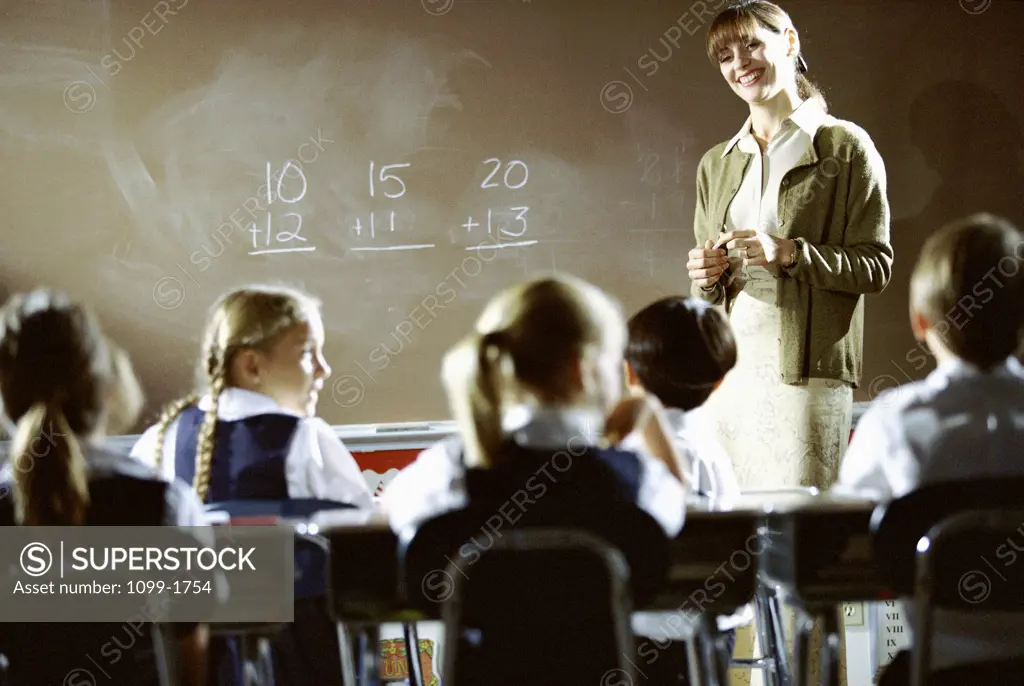 Teacher teaching mathematics in a classroom