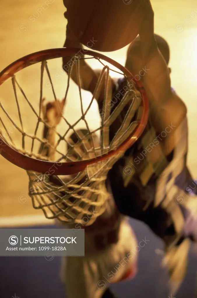 High angle view of two young men playing basketball