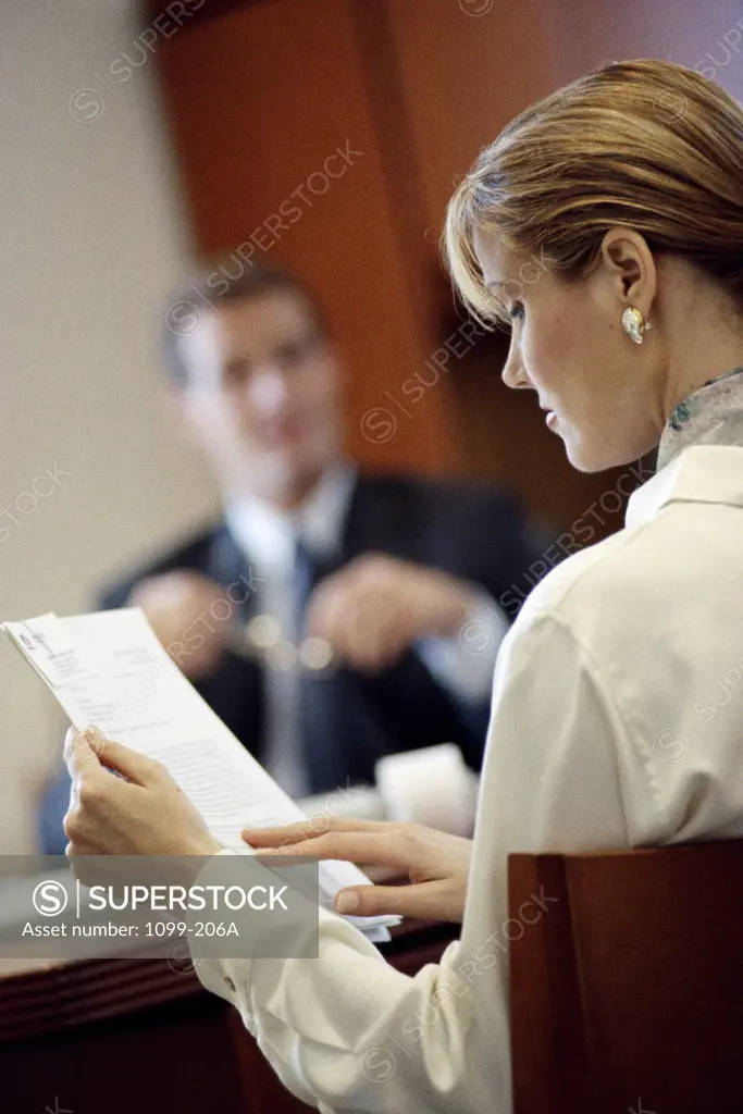 Businesswoman reading a document