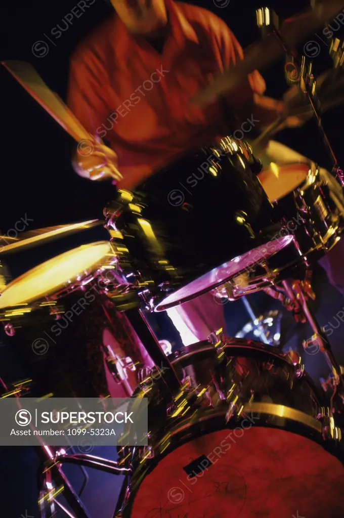 Young man playing the drums