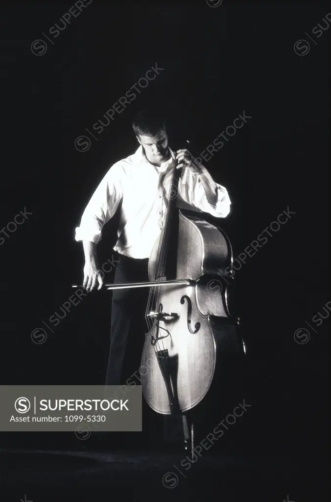 Young man playing the cello