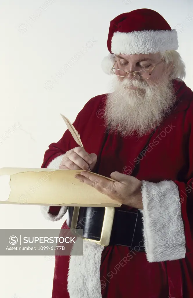 Portrait of Santa Claus writing letter