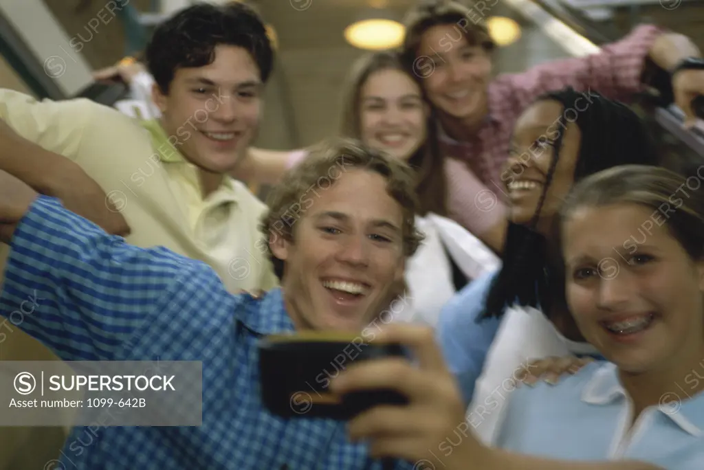 Group of teenagers taking a photograph of themselves