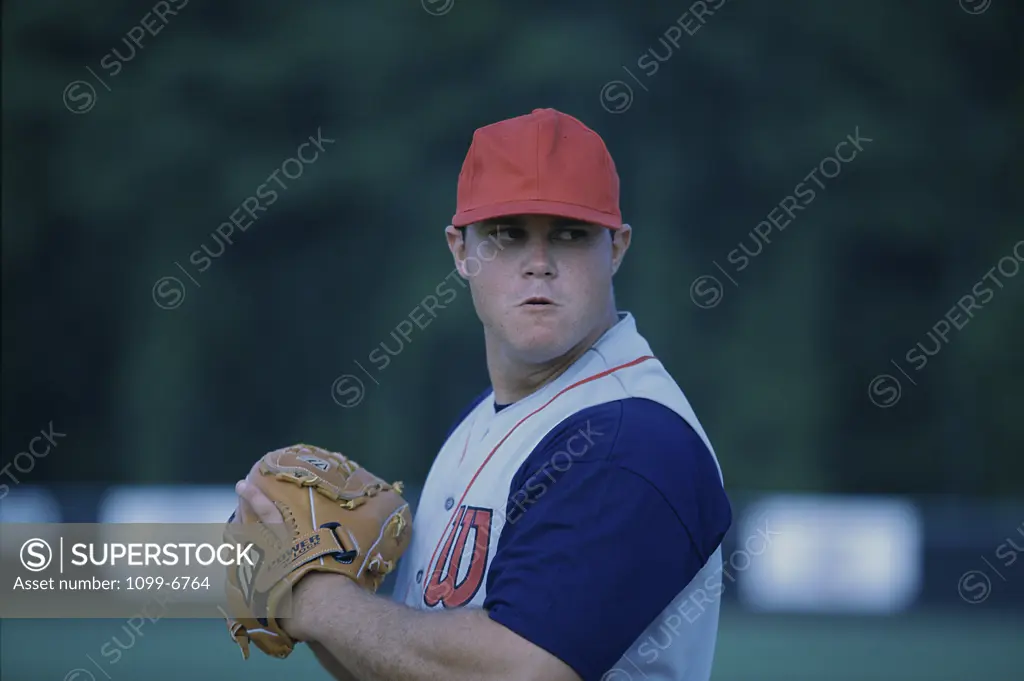 Baseball player wearing a baseball mitt