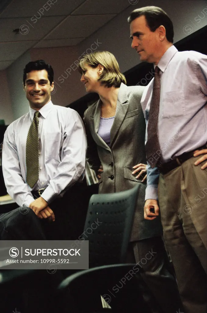 Business executives standing in an office