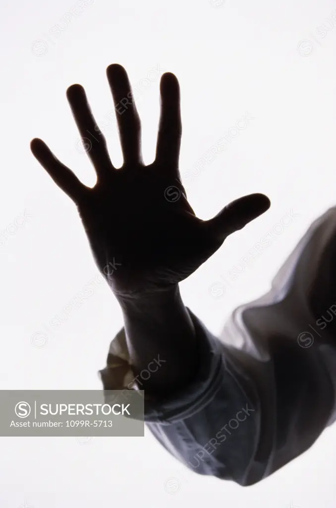 Silhouette of a person's hand