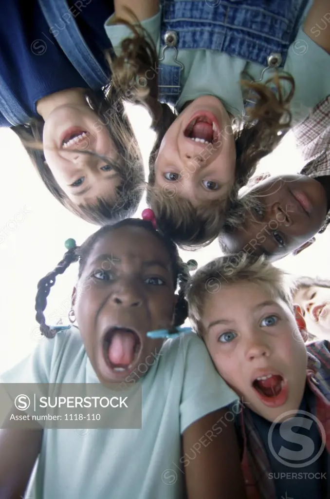 Portrait of a group of children in a huddle