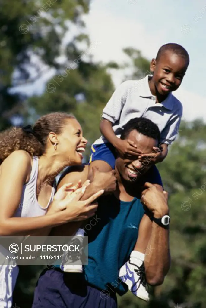 Close-up of parents with their son