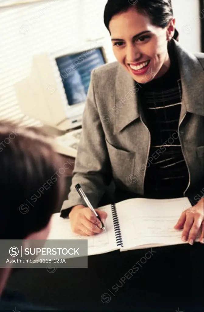 Businesswoman and a businessman in a meeting