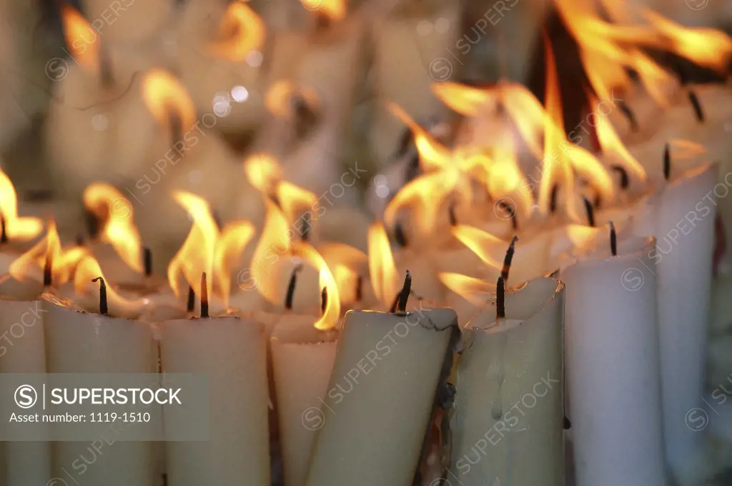 Array of lit candles