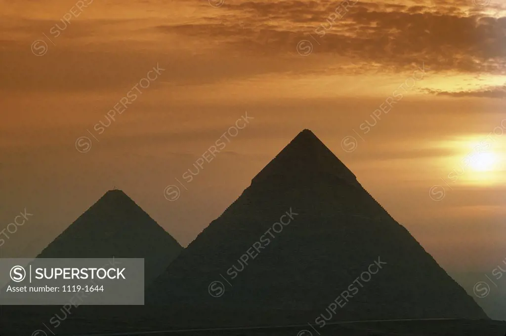 Silhouette of pyramids at dusk, Great Pyramid, Giza, Egypt