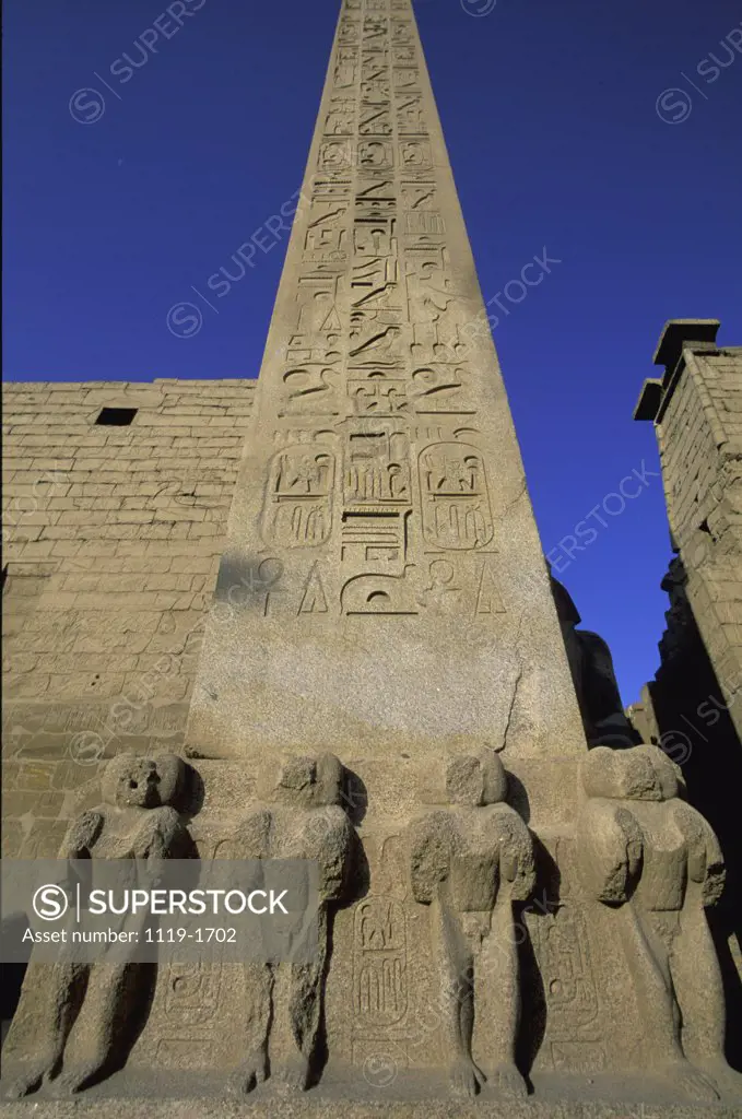 Low angle view of hieroglyphics on a column, Temple Of Luxor, Luxor, Egypt