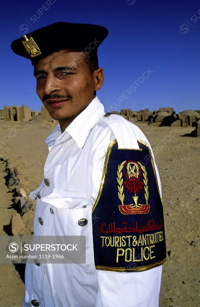 Side profile of a young policeman standing, Egypt