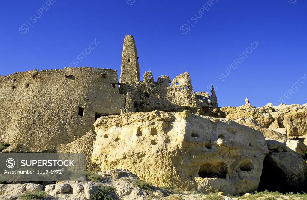 Low angle view of old ruins of a temple, Oracle Temple, Siwa Oasis, Egypt