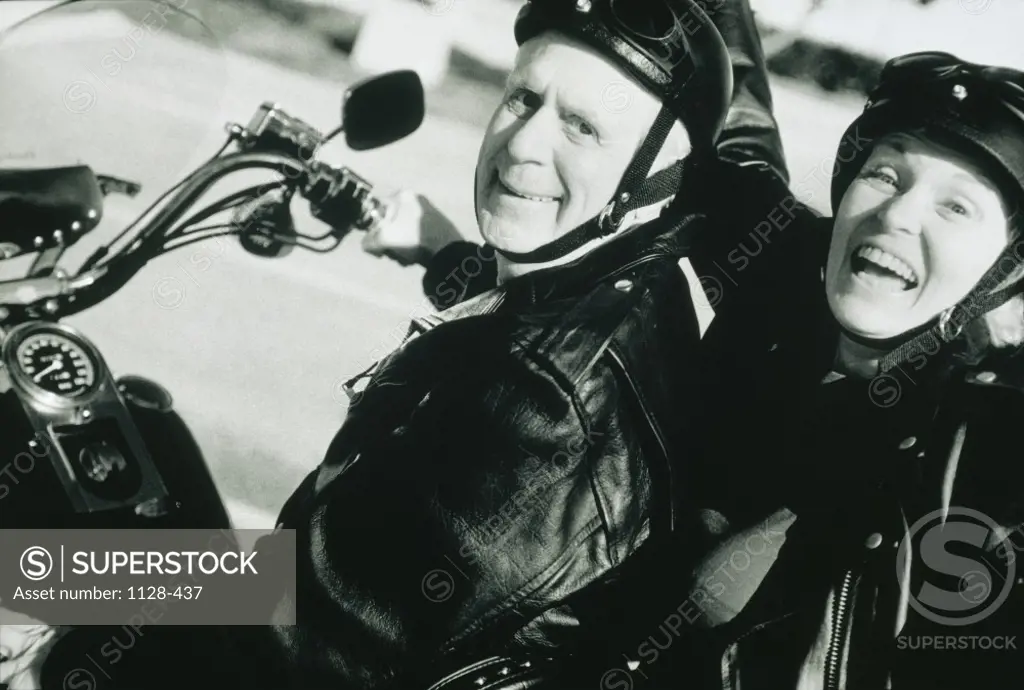 Portrait of a senior couple on a motorcycle