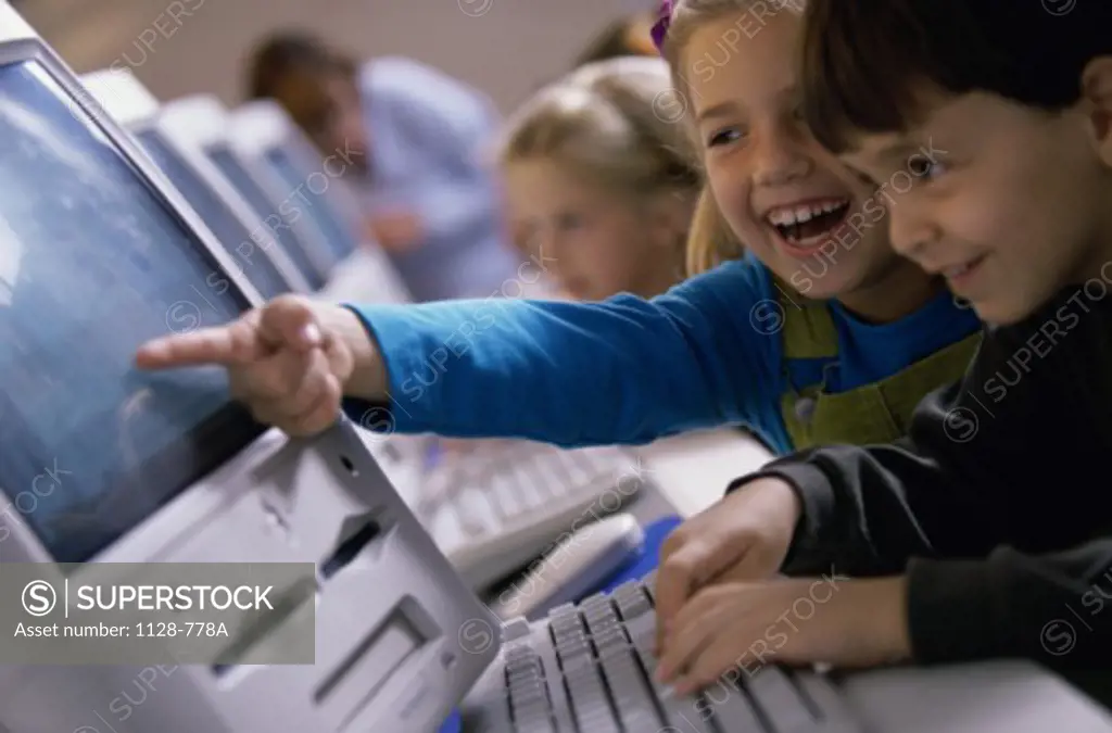 Children in front of a computer