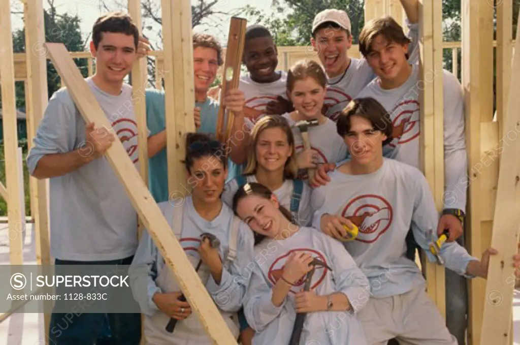Group of young people at a construction site