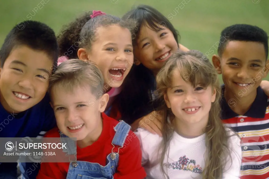 Portrait of a group of children smiling