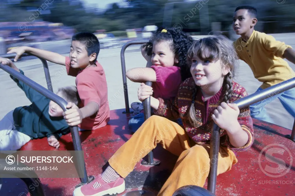 Group of children on a merry-go-round