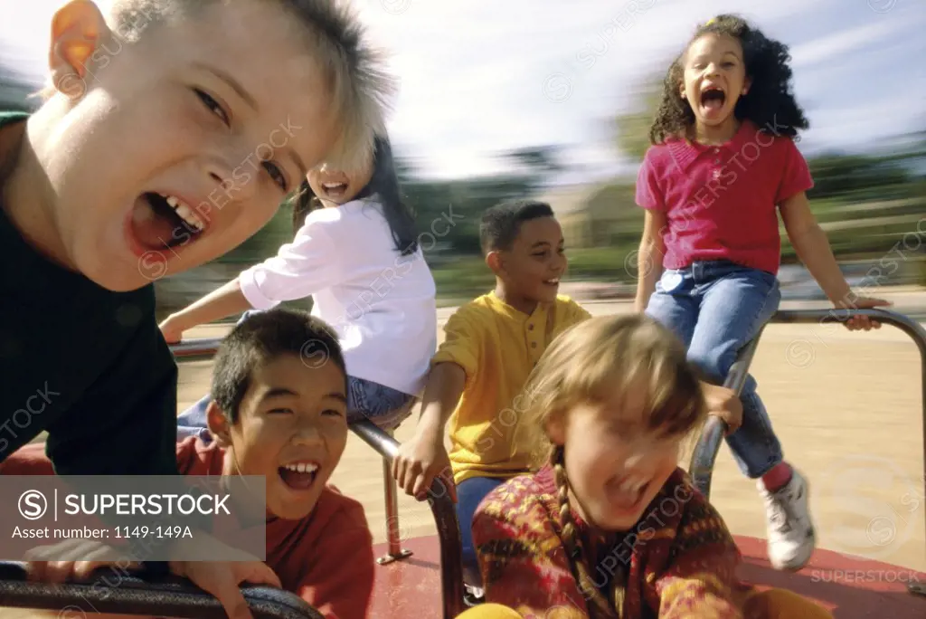 Group of children on a merry-go-round