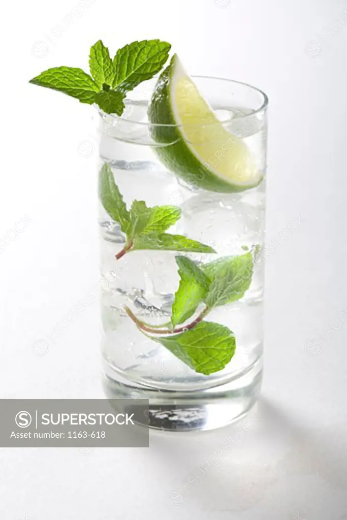 Close-up of a mojito with mint leaves and a slice of lime