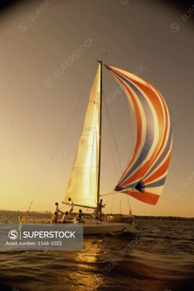 Group of people sailing on a sailboat