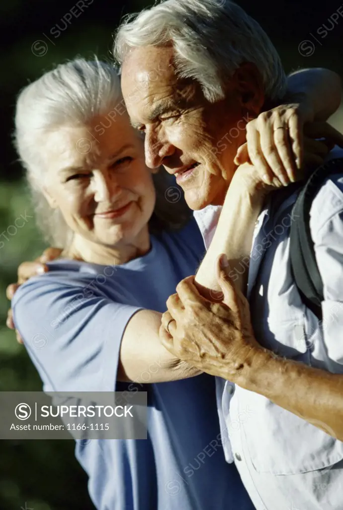 Portrait of a senior couple holding each other