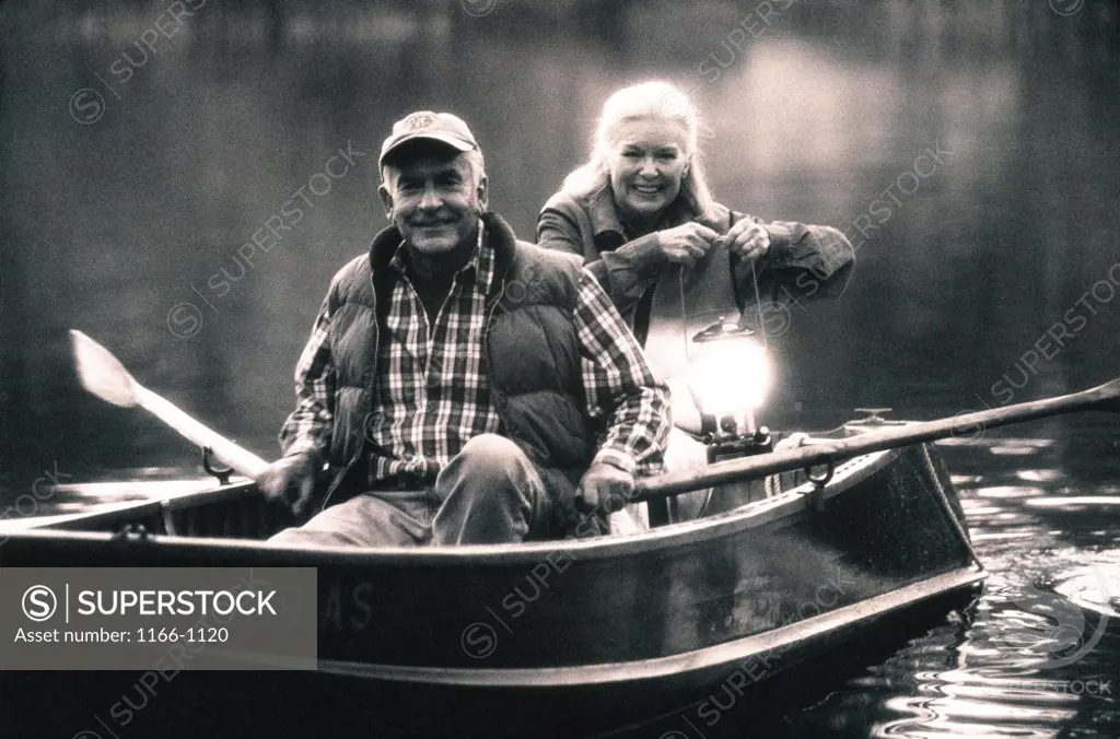 Portrait of a senior couple in a row boat