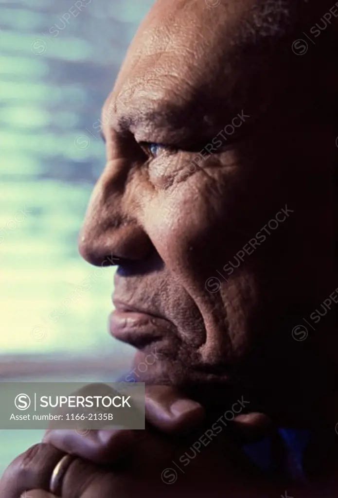 Close-up of a senior man looking serious