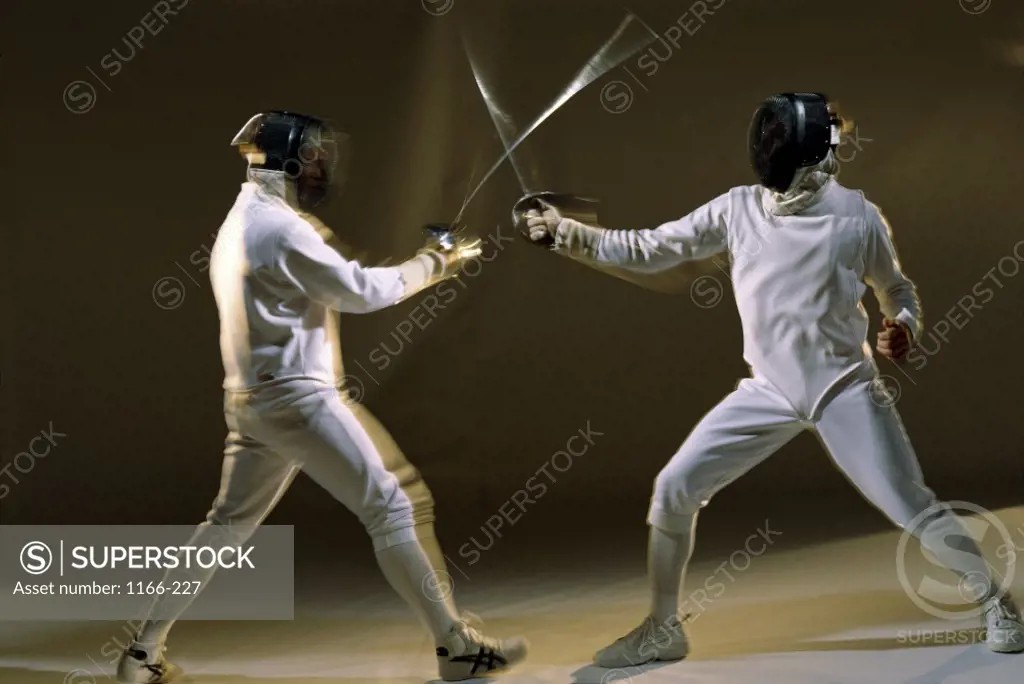 Side profile of two people fencing