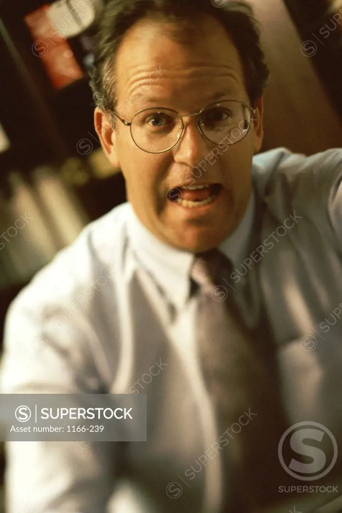 Portrait of a businessman with his mouth open