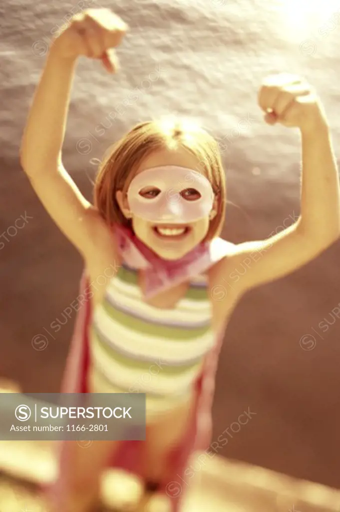 High angle view of a girl wearing a mask