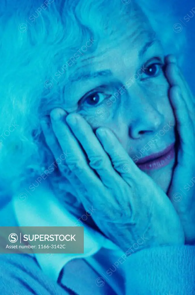 Close-up of a senior woman looking worried