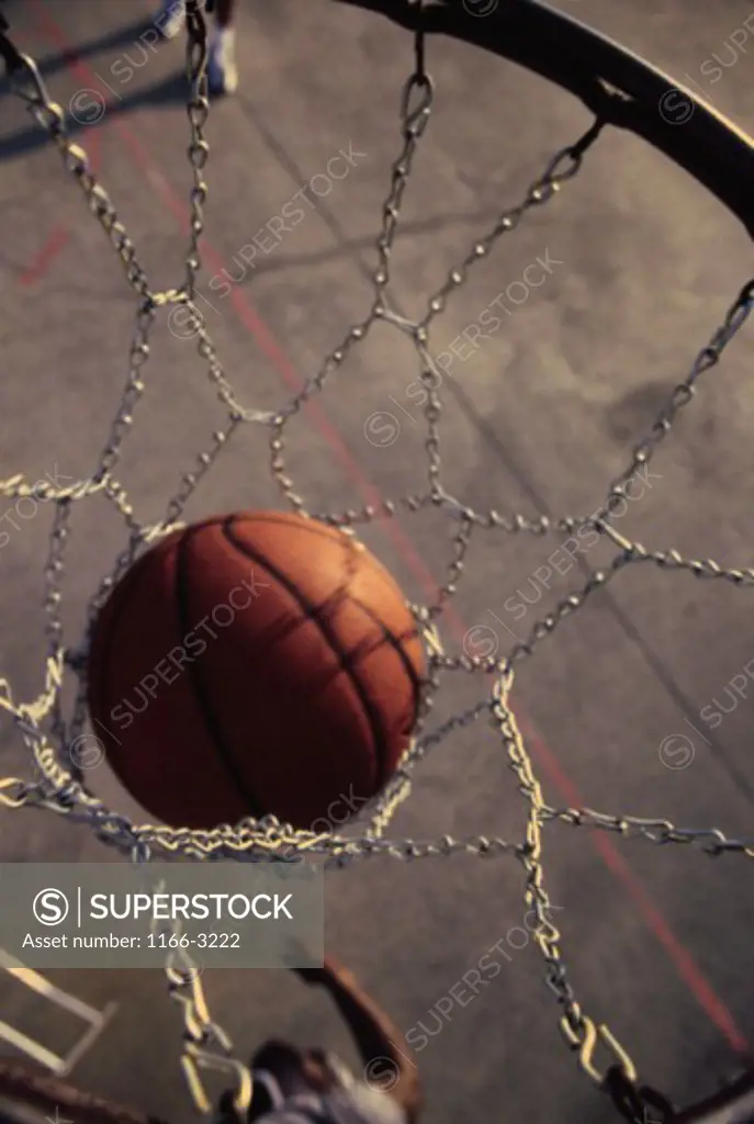 High angle view of a basketball in a net