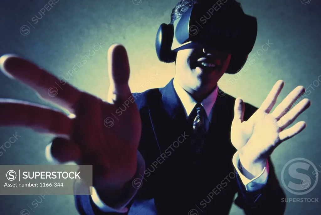 Businessman wearing virtual reality goggles