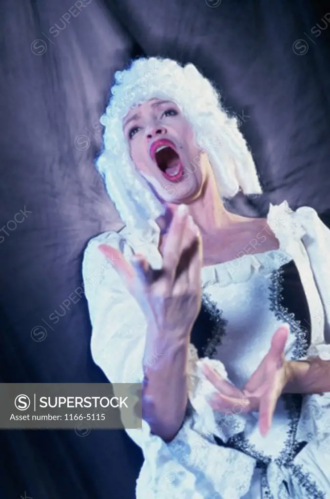 Low angle view of a female opera singer performing