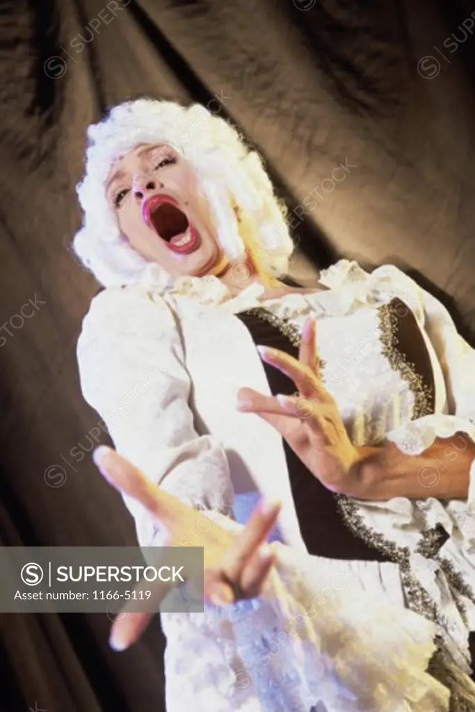 Low angle view of a female opera singer performing