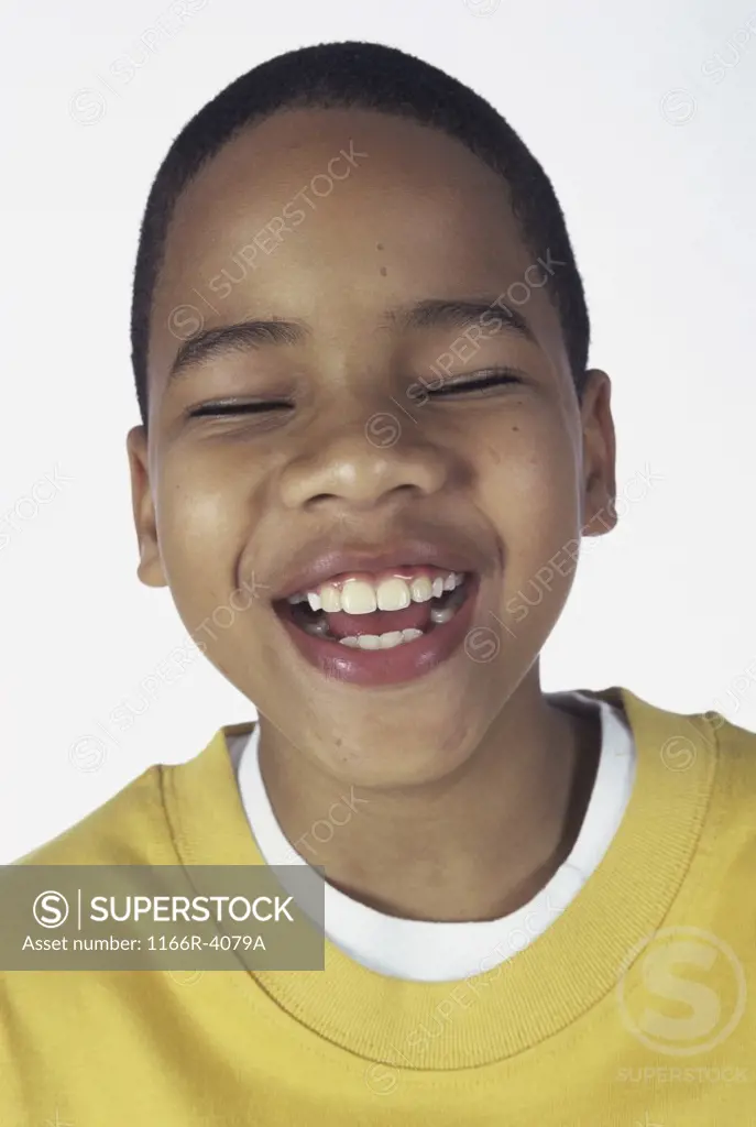 Close-up of a boy laughing