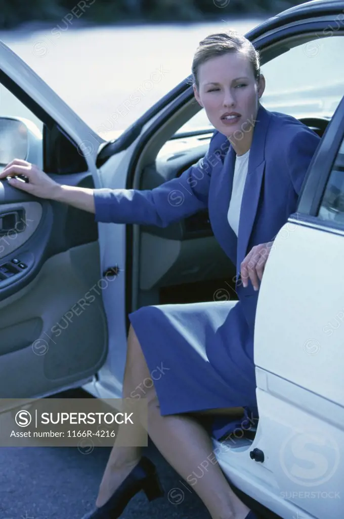 Portrait of a businesswoman sitting in a car