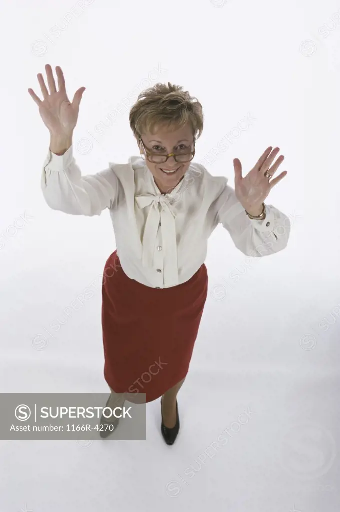Portrait of a senior woman waving
