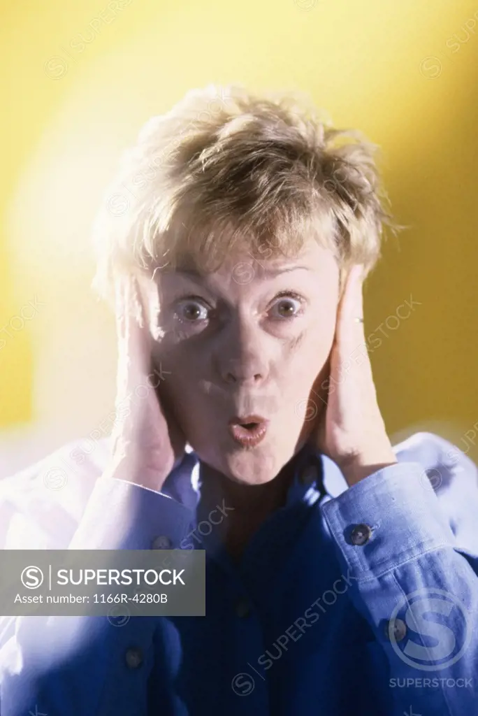 Portrait of a surprised senior woman