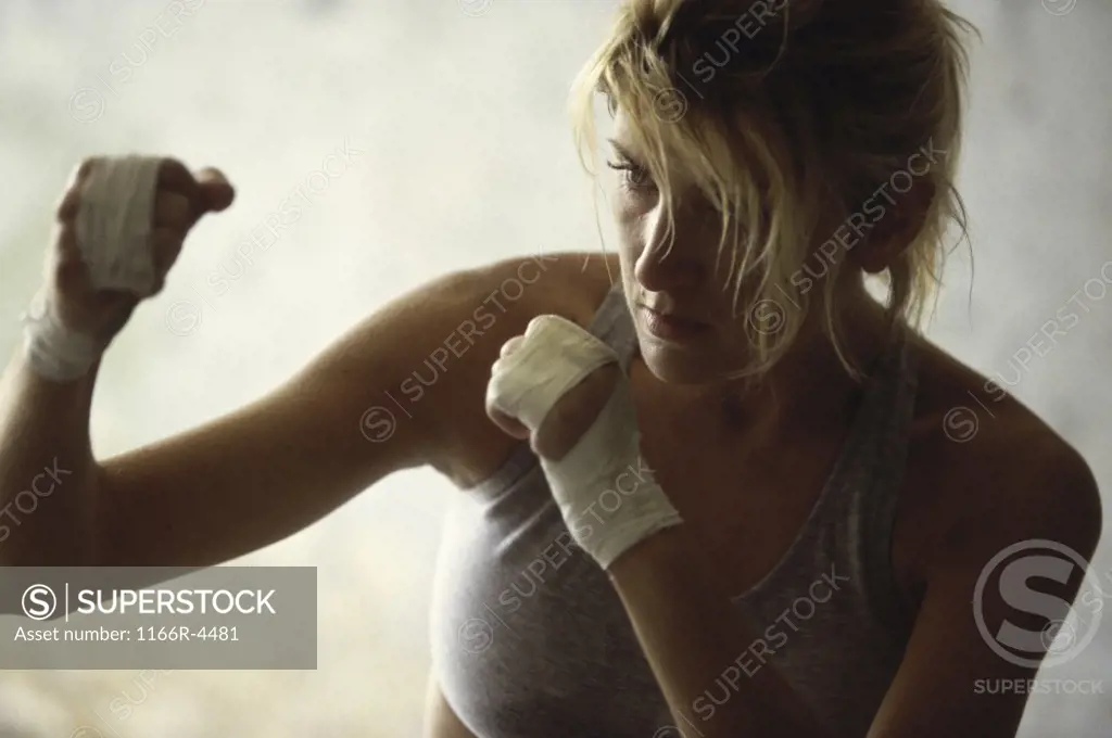 Female boxer practicing